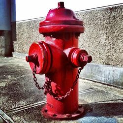 Close-up of red object on wall