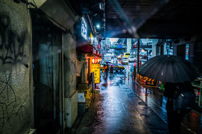 Man in city at night