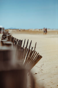 Scenic view of beach against clear sky