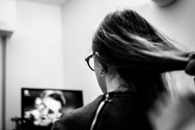 Close-up portrait of woman at home