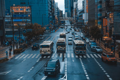 High angle view of traffic on city street and buildings