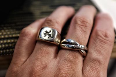 Close-up of hand wearing rings