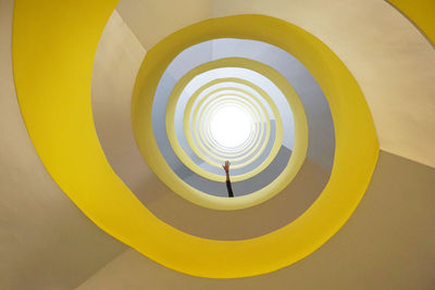 Low angle view of spiral staircase in building