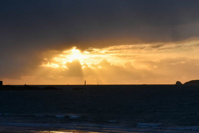 Scenic view of sea at sunset