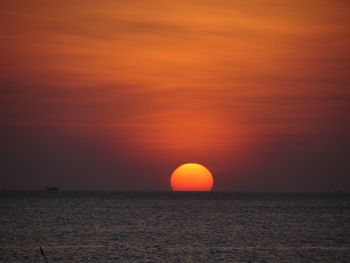 Scenic view of sea at sunset
