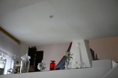 White wine bottles on table at home