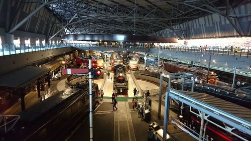 People on railroad station platform