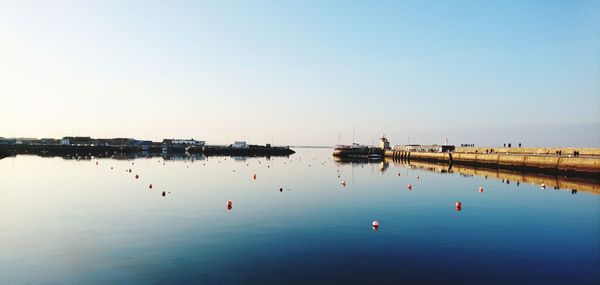 Scenic view of sea against clear sky