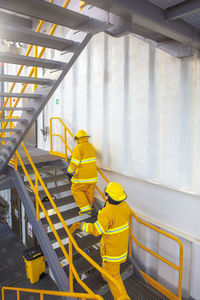 Man working on staircase