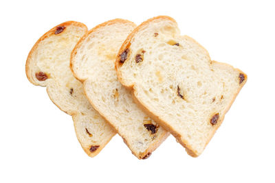 High angle view of bread against white background