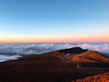 Scenic view of landscape against sky during sunset