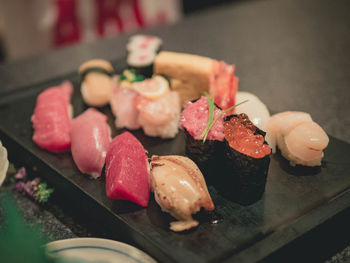 Close-up of sushi served on table