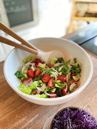 High angle view of salad in bowl on table