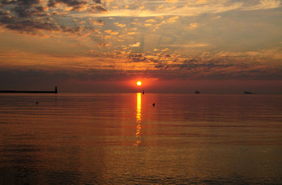 Scenic view of sunset over sea