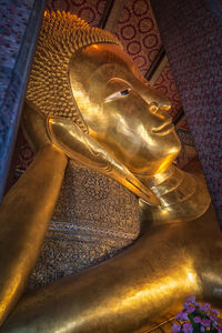 Statue of buddha outside building