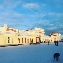 View of buildings in city against sky