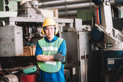 Portrait of man working in factory