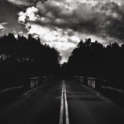 Road against cloudy sky