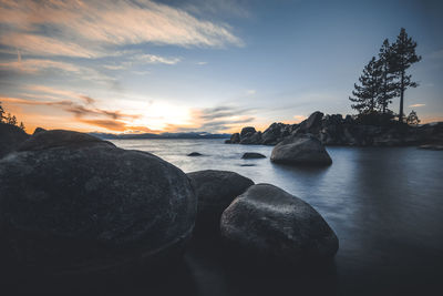 Scenic view of sea against sky during sunset