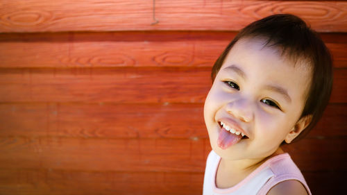 Close-up portrait of smiling boy