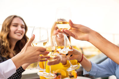 Young woman drinking glass with drink