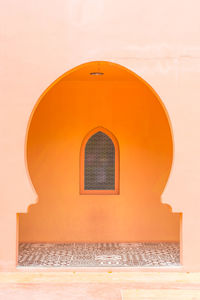 Exterior of historic building seen through window