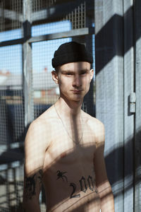 Portrait of young man looking away