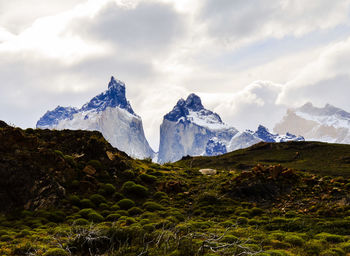 Scenic view of snowcapped mountains against sky