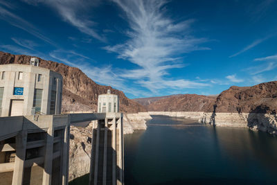 Hoover dam and lake mead with nevada time seen from nevada against cloudy sky