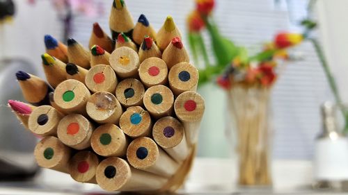 Close-up of colored pencils on table