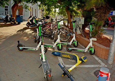 Bicycles parked on street in city