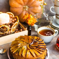 High angle view of apple pie in plate on table