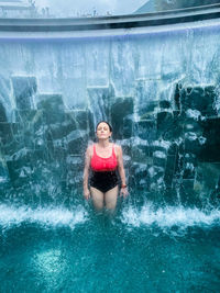 Portrait of woman in swimming pool
