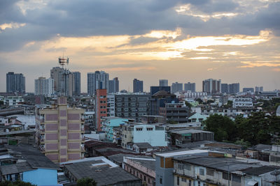 Cityscape against sky during sunset