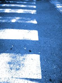 Close-up of shadow on the road