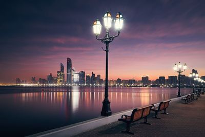 Urban skyline with skyscrapers at beautiful sunrise. cityscape abu dhabi, united arab emirates.