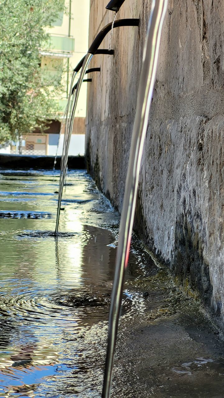 water, architecture, built structure, day, nature, no people, building exterior, outdoors, reflection, plant, flowing water, waterfront, wet, tree