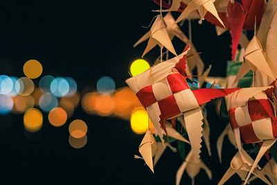 Close-up of illuminated christmas lights at night