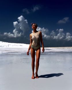 Woman standing on beach