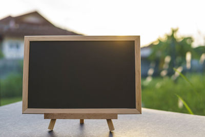Close-up of chair on table at park