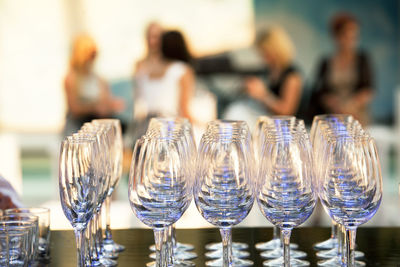 Close-up of empty wineglasses on table