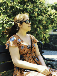 Young woman looking away outdoors