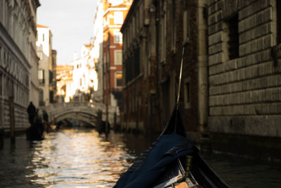 Canal passing through city buildings