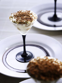 Close-up of ice cream in glass on table