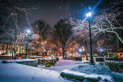 Illuminated street during winter at night