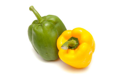 Close-up of bell peppers against white background
