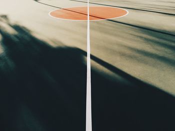 Sunlight falling on empty basketball court