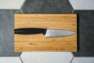 High angle view of cutting board on table