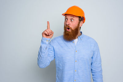 Man standing against white background