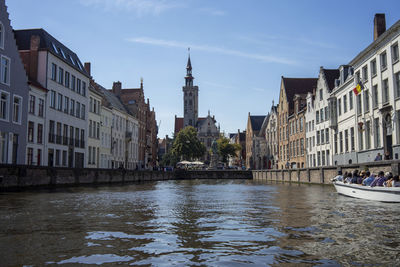 Canal passing through city buildings